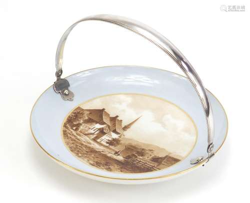 19th century porcelain plate with Continental silver swing handle, the plate hand painted with a