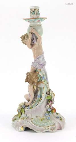 Large German porcelain Putti design candlestick encrusted with flowers by Plaue, 39cm high : For