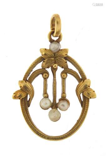 Arts and Crafts design unmarked gold seed pearl pendant (tests as 15ct gold) in the style of