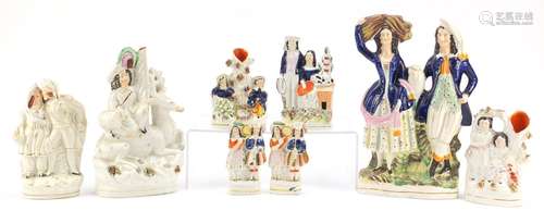 Victorian Staffordshire flat back figures and spill vases including Saint George & The Dragon, the