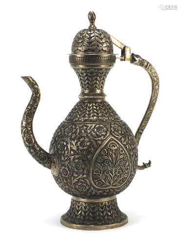 Indian silver coloured metal wine ewer embossed and engraved with flowers, 36cm high : For Further