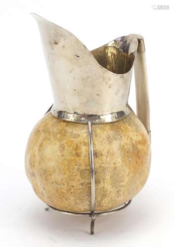 Continental gourd pitcher with silver coloured metal mounts and bone handle, 26cm high : For Further