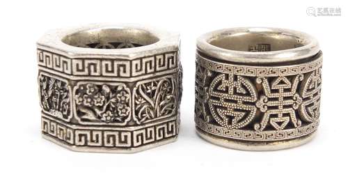 Two silver coloured metal archer's rings including one with rotating band : For Further Condition