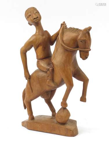 Large wood carving of a figure on horseback, 52cm high : For Further Condition Reports Please