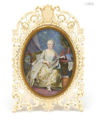 Good 19th century carved ivory easel frame housing an oval portrait miniature hand painted with a