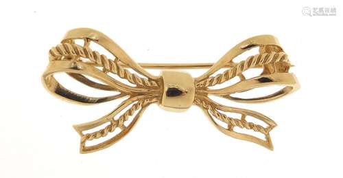 Unmarked gold bow brooch, (tests as 9ct gold) 3.5cm in length, 3.5g : For Further Condition