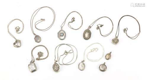 Ten silver lockets and eight silver necklaces, 59.7g : For Further Condition Reports Please Visit