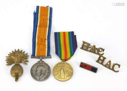 British military World War I pair, Honourable Artillery Company badge and shoulder titles, the