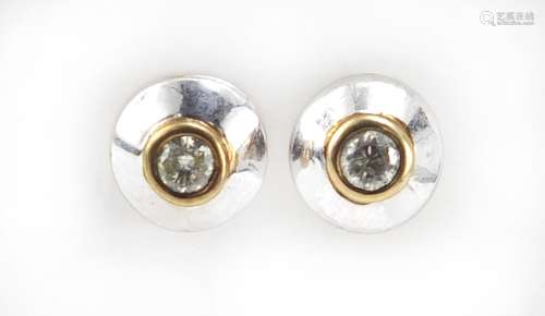 Pair of 9ct gold diamond solitaire earrings, 7mm in diameter, 1.1g : For Further Condition Reports