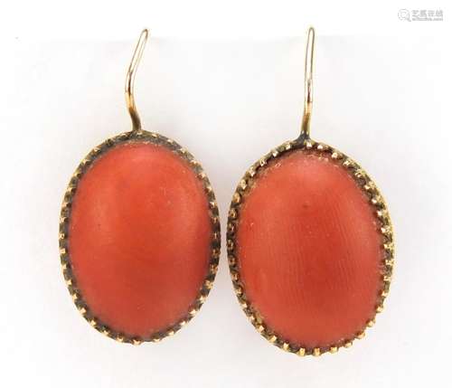 Pair of Dutch gold and coral earrings, impressed oak leaf mark to the pins, 2.5cm in length, 3.