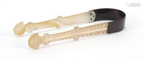 Pair of George III carved mother of pearl and tortoiseshell sugar tongs, 12.5cm in length : For