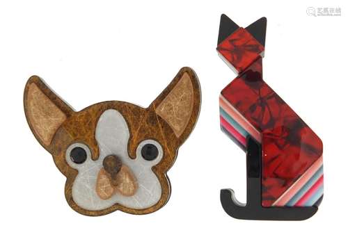 Two Lea Stein style brooches in the form of a stylised cat and dog's head, the largest 7cm high :