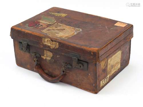 Vintage brown leather suitcase with shipping labels, 46cm wide : For Further Condition Reports