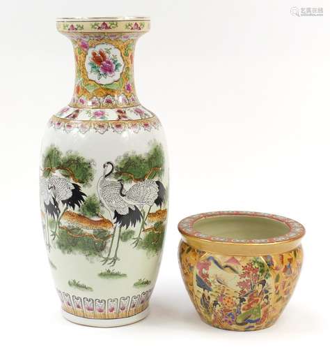 Large Chinese porcelain vase and fish bowl, the vase hand painted with storks amongst trees, the