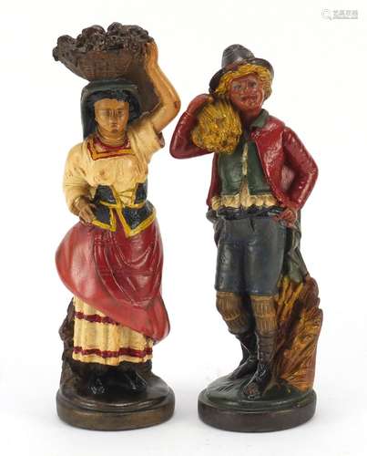 Pair of hand painted plaster figures of farmers, the largest 29.5cm high : For Further Condition