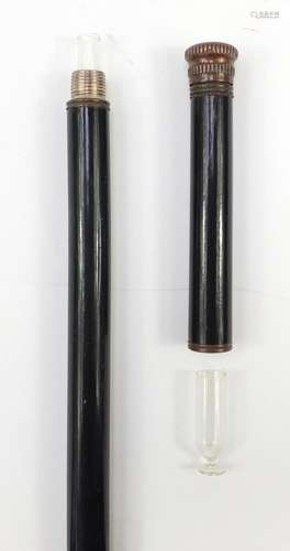 Gentlemen's ebonised tipple walking stick concealing two glass containers, 90.5cm in length : For