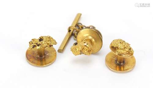 Pair of unmarked gold nugget studs and a lapel pin, (tests as 18ct gold+) the weight of the gold 5.