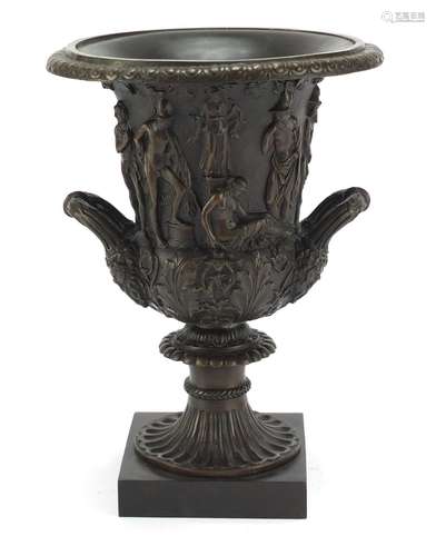 Large patinated bronze classical campana urn with twin handles decorated in relief with classical