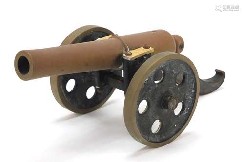 Cast iron and bronzed table cannon, 32cm in length : For Further Condition Reports Please Visit