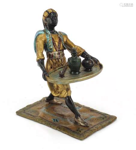 Cold painted bronze of an Arab holding a tray in the style of Franz Xaver Bergmann, 10.5cm high :