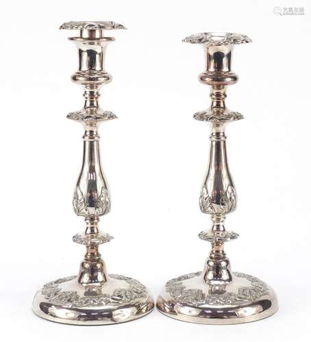 Pair of classical silver plated candlesticks, each 28.5cm high : For Further Condition Reports