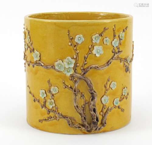 Chinese porcelain yellow ground brush pot hand painted and decorated in relief with peony blossom,