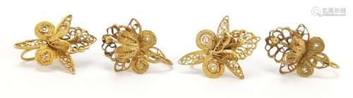 Two pairs of unmarked gold filigree flower earrings, (tests as 9ct gold) the largest 2cm in