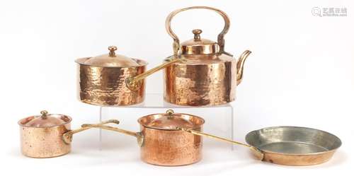 Copper kitchenalia including graduated set of three saucepans and a kettle, the largest 39cm in