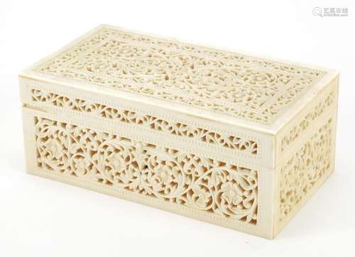 Anglo Indian ivory casket finely and profusely carved and pierced with flower heads amongst foliage,