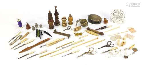 Antique and later objects including ivory whistle, silver thimble, treen needle cases, brass tape