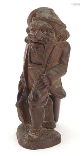 Pair of carved Black Forest nutcrackers in the form of a man, 21cm high : For Further Condition