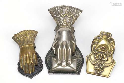 Three 19th century letter clips including two in the form of a hand, the largest 14.5cm in