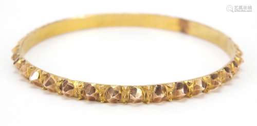Unmarked gold bangle, (tests as 9ct gold) 6.5cm in diameter, 18.4g : For Further Condition Reports