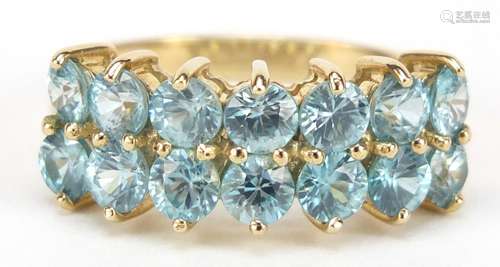 9ct gold two row blue topaz half eternity ring, size N, 3.7g : For Further Condition Reports