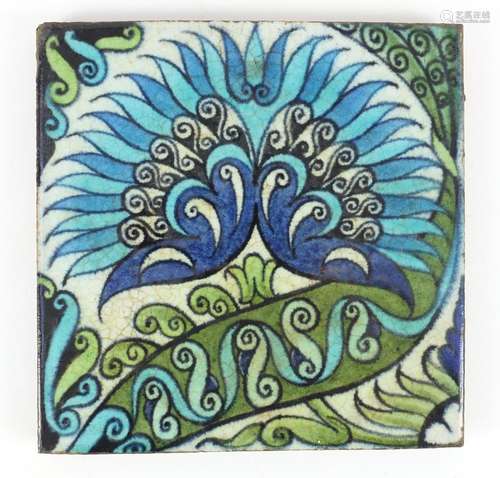 Arts & Crafts pottery tile hand painted in the Iznik manner with flowers, by William de Morgan,