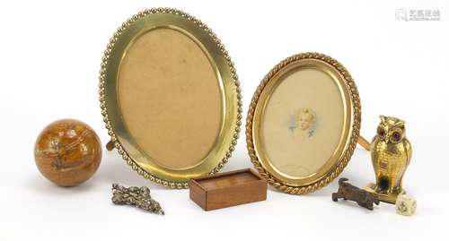 Antique and later objects including two Victorian gilt brass rope twist frames, brass owl with