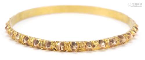 Unmarked gold bangle, (tests as 9ct gold) 6.5cm in diameter, 19.2g : For Further Condition Reports