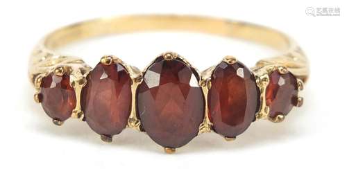 9ct gold graduated garnet five stone ring, size U, 3.1g : For Further Condition Reports Please Visit