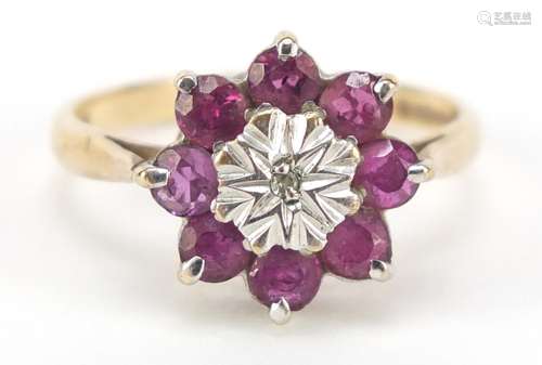 9ct gold ruby and diamond flower head ring, size K, 2.2g : For Further Condition Reports Please