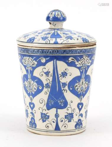 Turkish Iznik pottery jar and cover, hand painted with stylised flowers, 19.5cm high : For Further