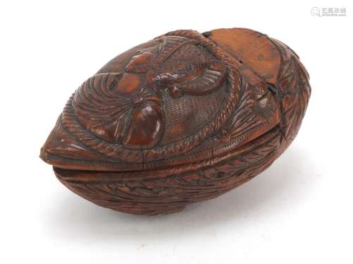 18th century coquilla nut snuff box carved with a male and female, 8.5cm in length : For Further