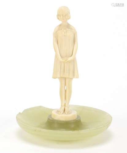 Art Deco carved ivory figure of a young girl mounted on an onyx dish, 13cm high : For Further