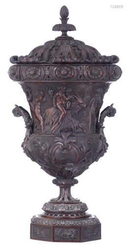 An imposing and finely sculpted walnut Renaissance Revival Medici vase, decorated with scrollwork, a