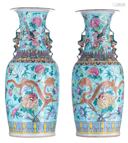 A pair of large Chinese turquoise ground and polychrome vases, decorated with flowers, ******s and p