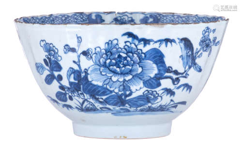 A Chinese blue and white lobed bowl, the front and r***rse decorated with a bird and peony branches,