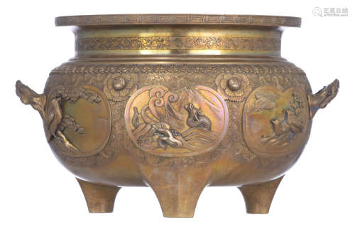 A Chinese relief decorated bronze tripod incense burner, the panels with birds, flowers and a ******