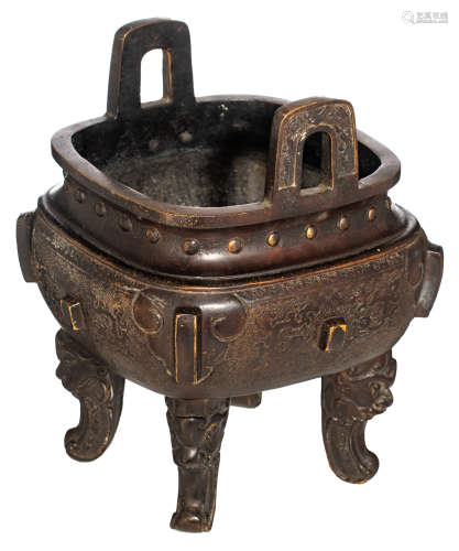 A Chinese archaic-style patinated quadrangular bronze incense burner, the legs mythical head-shaped,