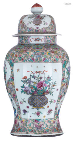 An impressive Chinese famille rose vase with cover, all over decorated with flowers and butterflies,