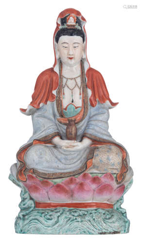 A Chinese polychrome decorated Guanyin, seated on a lotus base, late 19thC, H 45,5 cm