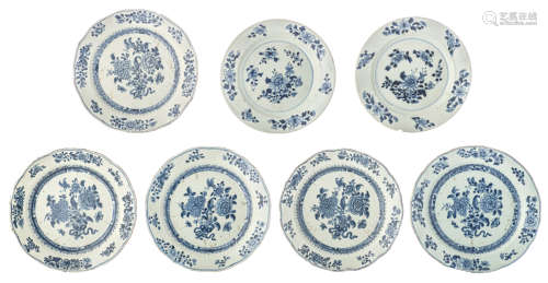 Five Chinese blue and white floral decorated dishes, the centre with butterflies; added two ditto di